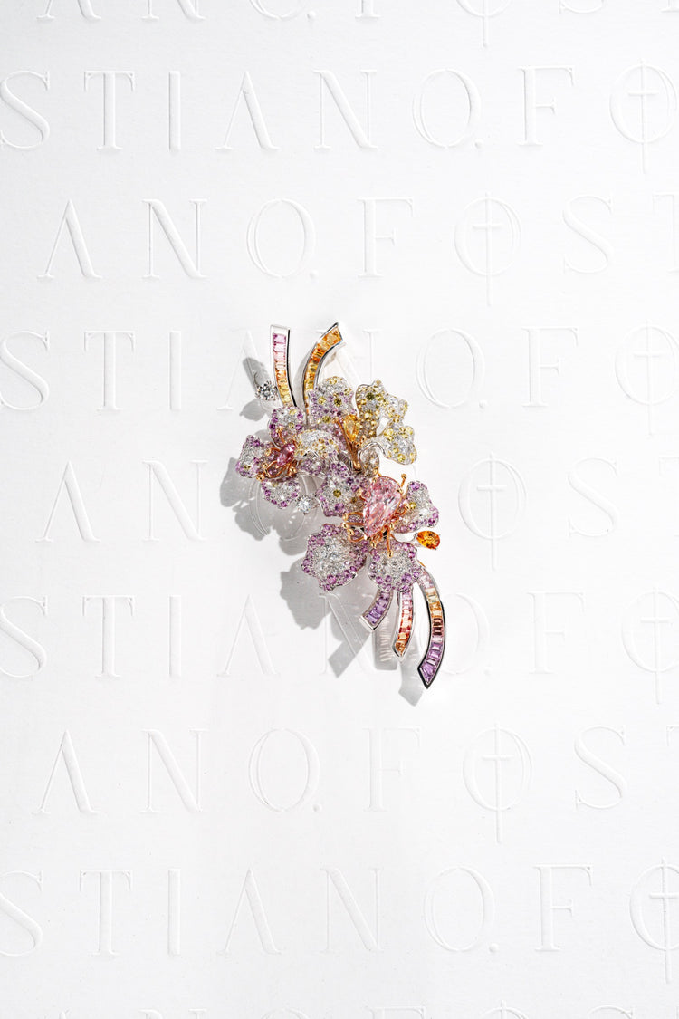 Fostiano pansy-inspired pink diamond floral brooch, with multicoloured gemstone petals and curved baguette-cut gemstone ribbons