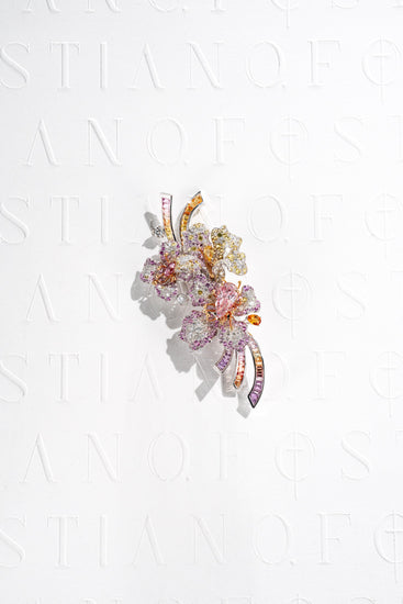 Fostiano pansy-inspired pink diamond floral brooch, with multicoloured gemstone petals and curved baguette-cut gemstone ribbons